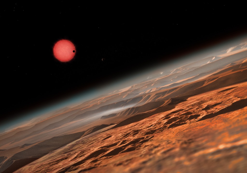 Artist's impression of TRAPPIST-1 as seen from the outermost of its three transiting planets. Image credit: ESO/M. Kornmesser