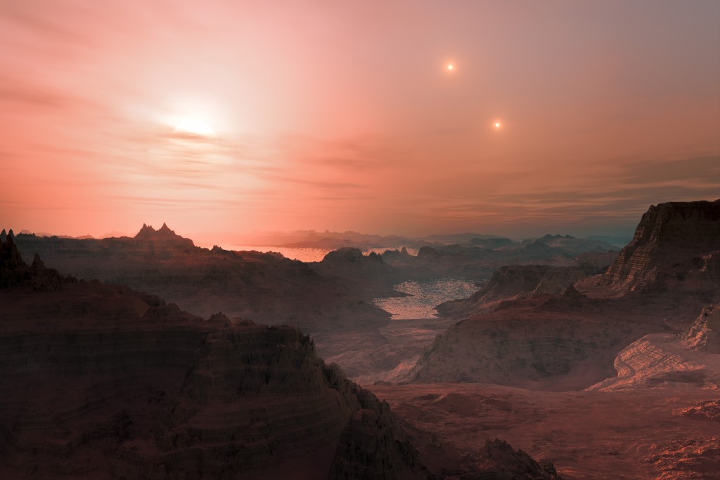 An artists' rendition of what sunset might look like on Gliese 667Cc.  The host star, Gliese 667C, orbits a distant stellar binary (Gliese 667AB), seen in the background.  Image credit: ESO/L. Calçada